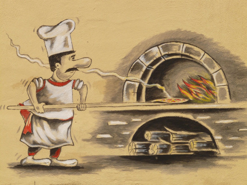 chef tossing pizza dough